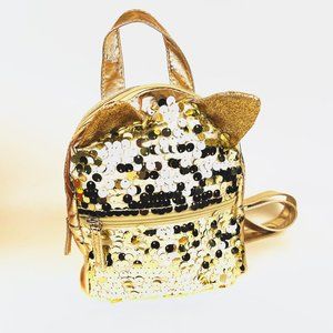 Charming backpack for a child is the perfect choice for the youngest in golden